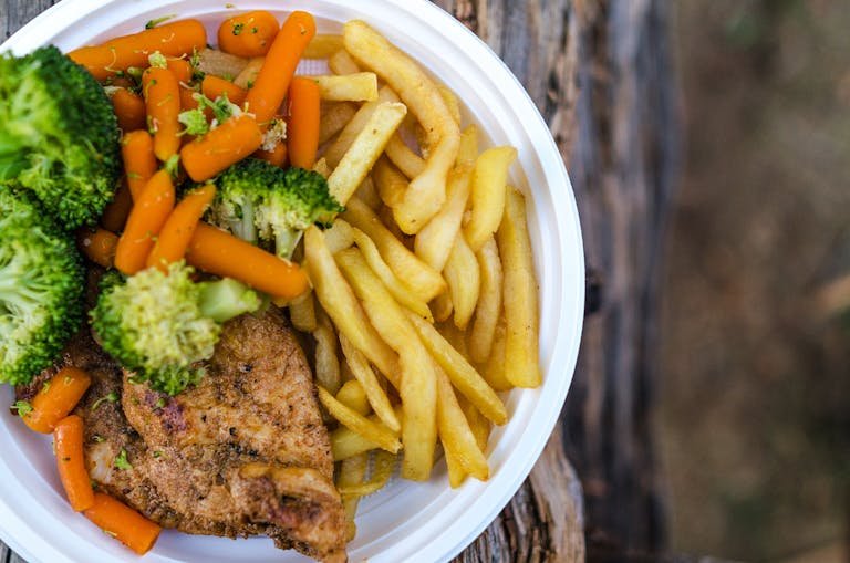 Sliced Meat With Vegetables and Potato Fries